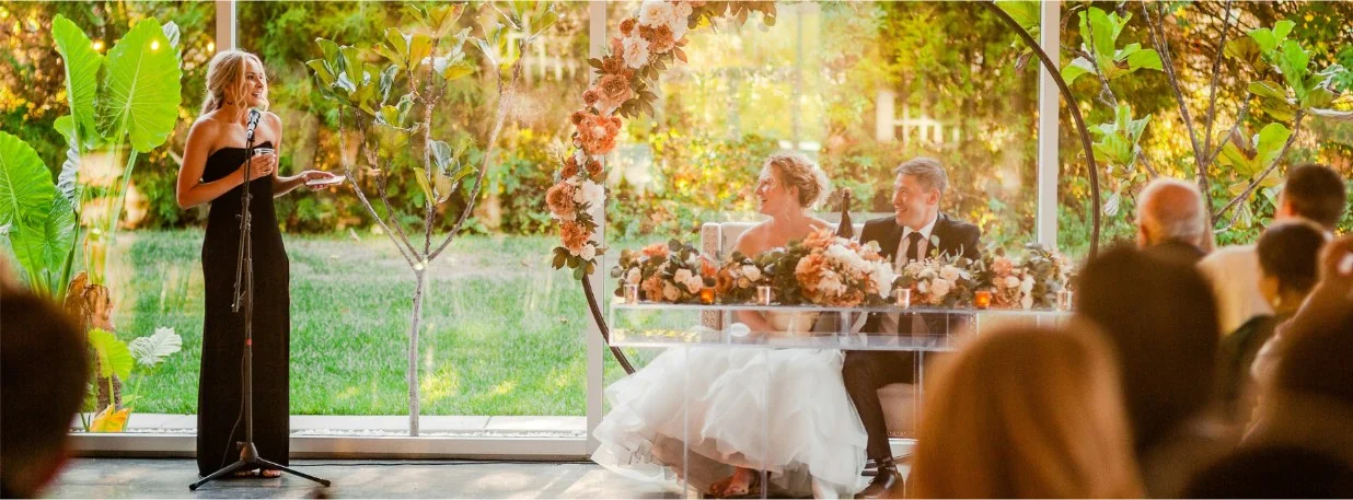 Wedding guests raising a toast